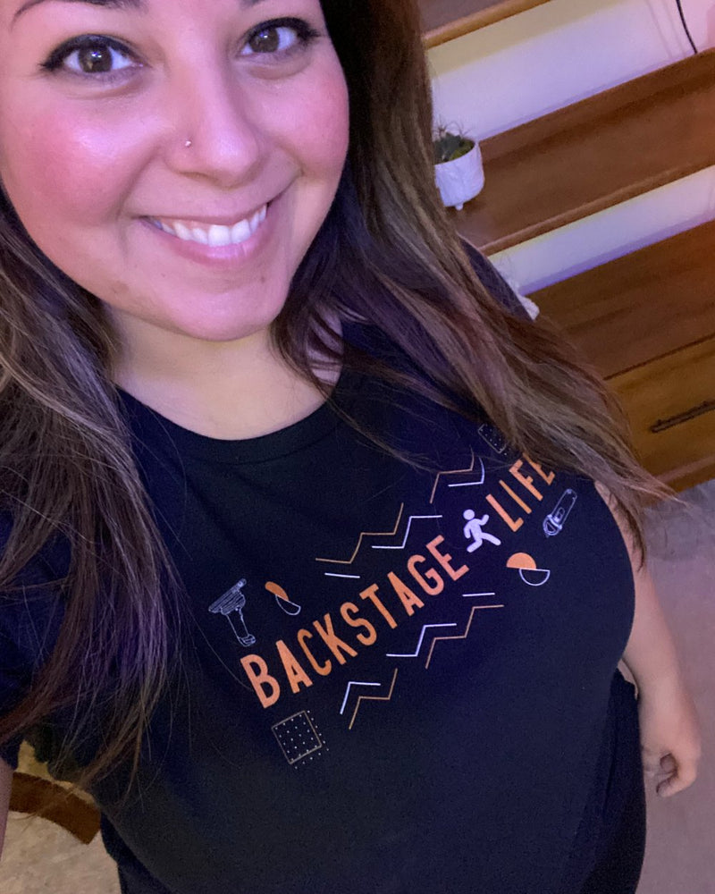 Customer wearing the Backstage Life shirt