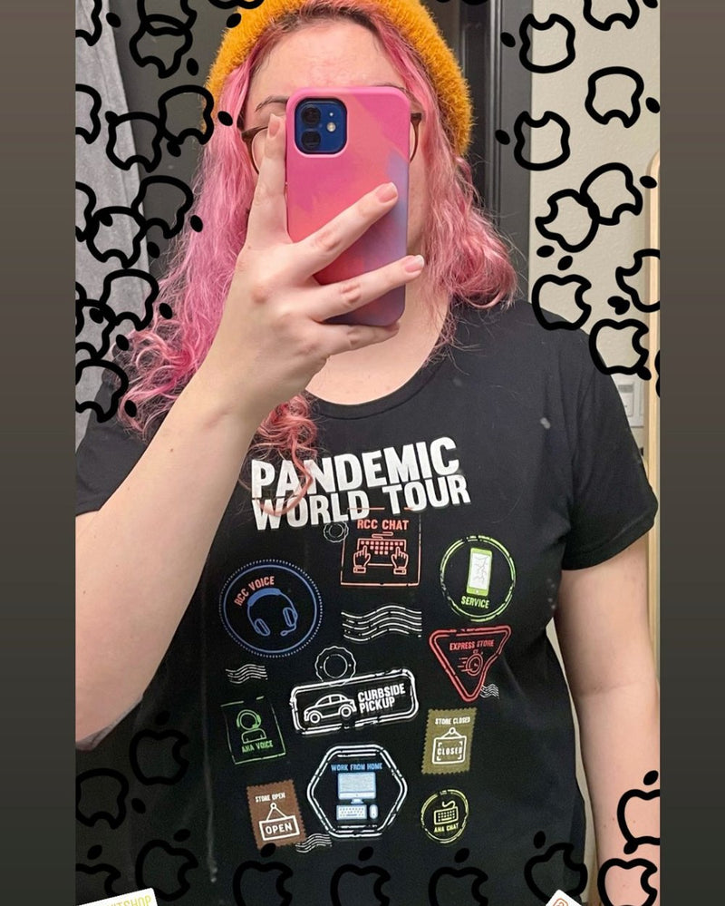 Customer taking a mirror selfie in the Pandemic World Tour shirt